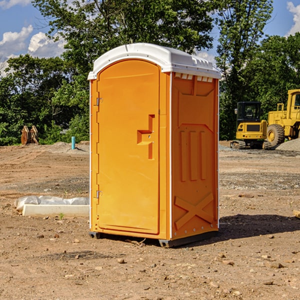 how often are the portable restrooms cleaned and serviced during a rental period in Barbeau Michigan